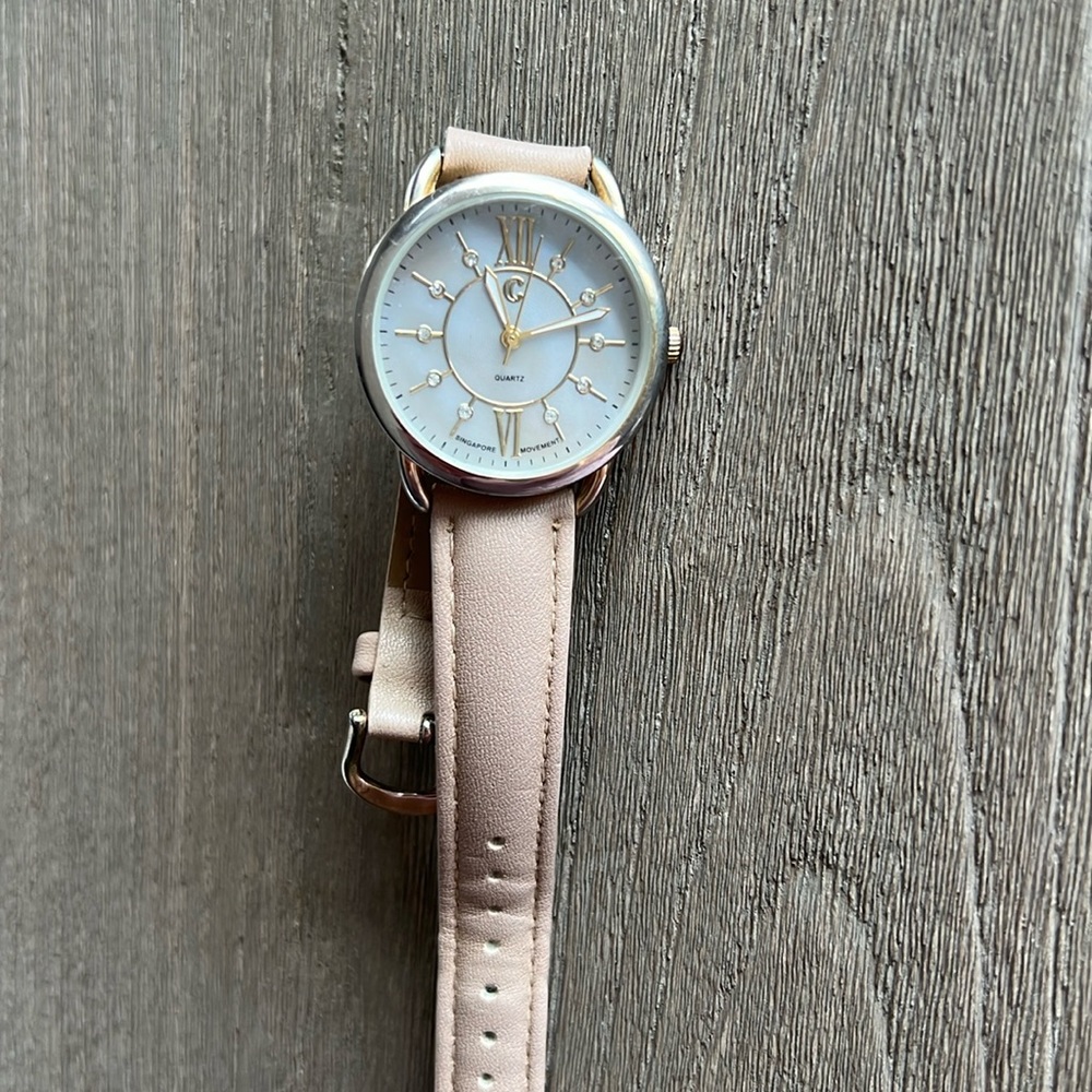 Watch with tan band